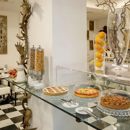 Lägenhetshotell Arcom Palace 4*