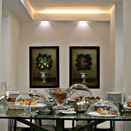 アパートホテル Arcom Palace 4*